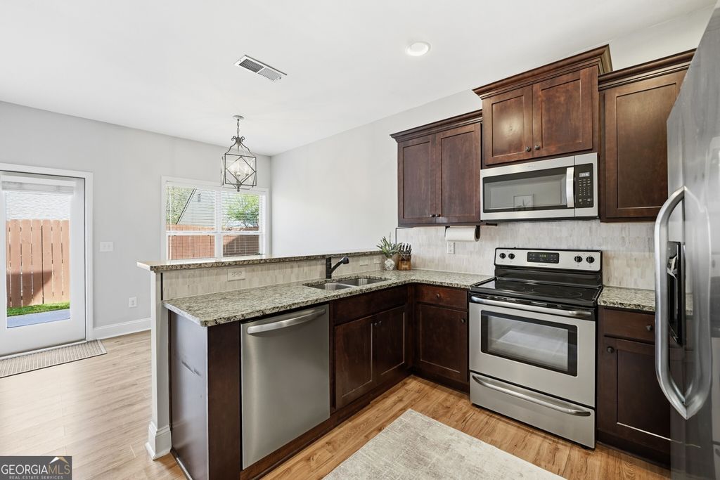 Photo of 552 Broughton Drive, Canton, GA 30114 (MLS # 10731672)