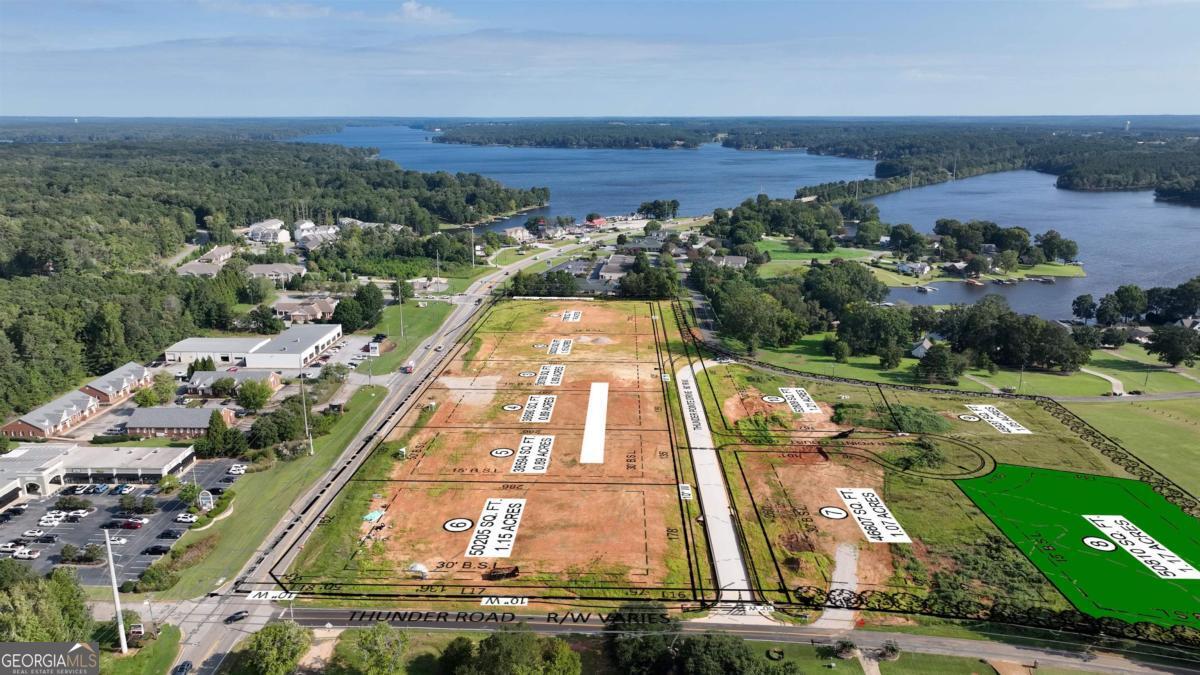 Welcome to Thunder Pointe Commercial complex. This community hosts 10 platted lots that are ready for you to build your business in the Lake Oconee Area. Located just a few miles south of the Lake Oconee Publix and just past the Scott Road/Hwy 44 intersection, this is a fast growing area that you don't want to miss out on. Lot 8 is a 1.17 acre parcel located on the corner of Thunder Pointe Drive and (future) Thunder Pointe Court. Covenants and ARB in place. Give us a call and set up a meeting to see if this location will be perfect for you!