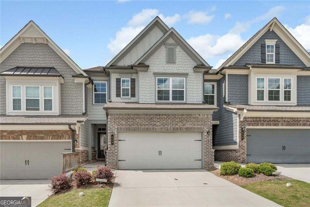 Photo of 649 Isom Walk, Suwanee, GA 30024 (MLS # 10867389)