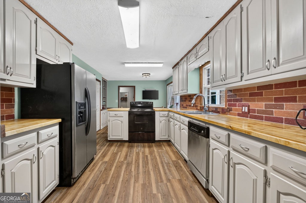Photo of 169 Silver Dollar Road, Barnesville, GA 30204 (MLS # 10843436)