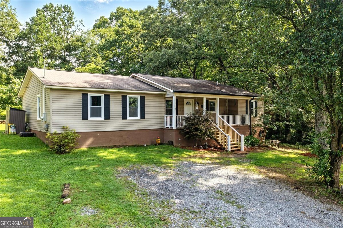 Tucked back off the road and in a country setting is this 4 bedroom, 2 bathroom home that is ready for new owners. Renovated right before current owners purchased and includes 4 bedrooms plus a bonus room that could used as an office, pantry, or craft room, but the current owners needed an additional bedroom so it's serving as a bedroom at the moment. Open floor plan between the living, kitchen, and dining area. The yard is mostly cleared off and has so much potential for all your outdoor dreams! There's a covered back deck and a fenced in area for the 4 legged family members. The property sits back on a shared driveway and you can't see the home from the road. There is no way to discreetly drive by the property because of the driveway being shared and it ends at their home. So don't make it awkward and please make appointments to view home.