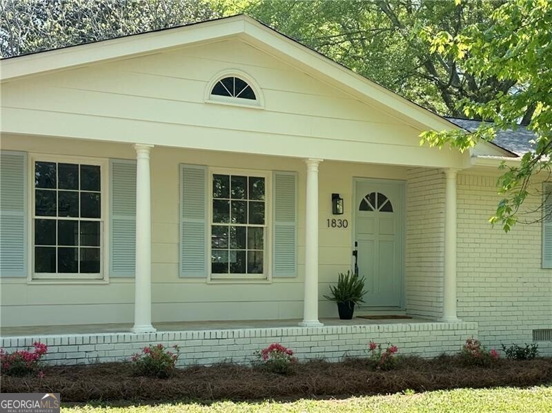 ATTENTION BUYERS **** $20,000 BUYER BONUS! Bonus can be applied to interest rate buy down, closing costs or adjustment in purchase price. Seller can do a quick close if needed. Charming Updated Ranch in Downtown Alpharetta! Welcome to 1830 Mayfield Road a beautifully renovated 3-bedroom, 2-bathroom ranch-style home located less than a mile from the vibrant heart of Canton Street. Nestled in one of Alpharetta's most sought-after communities, this home offers unmatched access to an array of local shops, dining, and entertainment options, all while providing a peaceful retreat to come home to. This delightful 4-sided brick home showcases a modern open-concept floor plan that seamlessly connects the living and family room areas perfect for entertaining or everyday comfort. Step inside to enjoy a fresh designer palette with new interior and exterior paint, luxury vinyl plank flooring, and oversized baseboards that add to the home's contemporary feel. Stylish touches throughout include a board and batten feature wall in the family room and shiplap accents in the guest bathroom. The kitchen and bathrooms shine with quartz countertops, new tile, and a completely updated primary bathroom featuring a spacious walk-in shower and modern vanity. Enjoy cooking and gathering in the kitchen with all-new stainless-steel appliances, including a range, dishwasher, and microwave. Additional upgrades include new lighting fixtures, recessed can lighting, and a ceiling fan for year-round comfort. Step outside to relax in the inviting 3-season porch or enjoy the expansive, flat backyard perfect for entertaining, gardening, or play. The outdoor space has been thoughtfully enhanced with new landscaping, including the addition of azalea and gardenia bushes that bring seasonal color and fragrance to the yard. Pre-built planters and two storage sheds add both beauty and functionality to this impressive outdoor retreat. With its thoughtful updates, timeless charm, and prime location in Downtown Alpharetta, this home is truly move-in ready. Don't miss the opportunity to own this beautifully updated gem in a community known for its exceptional quality of life!
