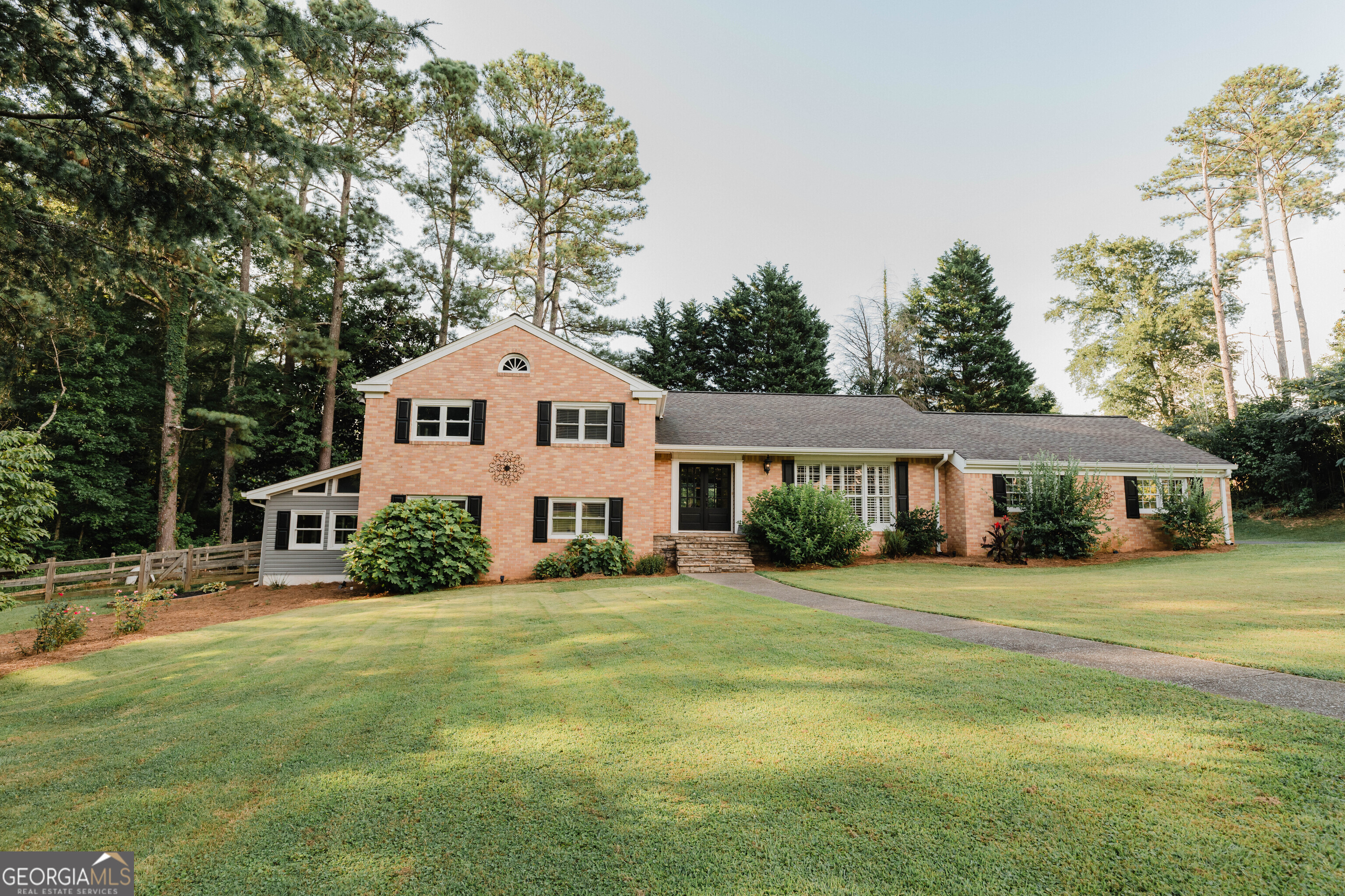 We're excited to announce a beautiful new listing in Bremen, Georgia! This charming 4-bedroom, 3.5-bath home is now available and offers the perfect blend of comfort, character, and convenience. Located on a quiet street, it's just a short walk from the award-winning Jones Elementary School. The home features a spacious sunroom with stunning beamed ceilings, a den, a separate family room, and a dedicated office space-providing plenty of room for both relaxation and productivity. The kitchen is well-appointed with ample counter space, an island, and a back glass door that opens to a welcoming porch overlooking a lovely garden area. Set on nearly an acre of land, the property boasts established landscaping, a small backyard garden, and a peaceful setting that's hard to find. The home's classic 4-sided brick construction is complemented by shutters, a carport with extra parking, and a convenient horseshoe driveway. This is a truly special home in one of Bremen's most desirable locations. For more information or to schedule a showing, please contact us today.