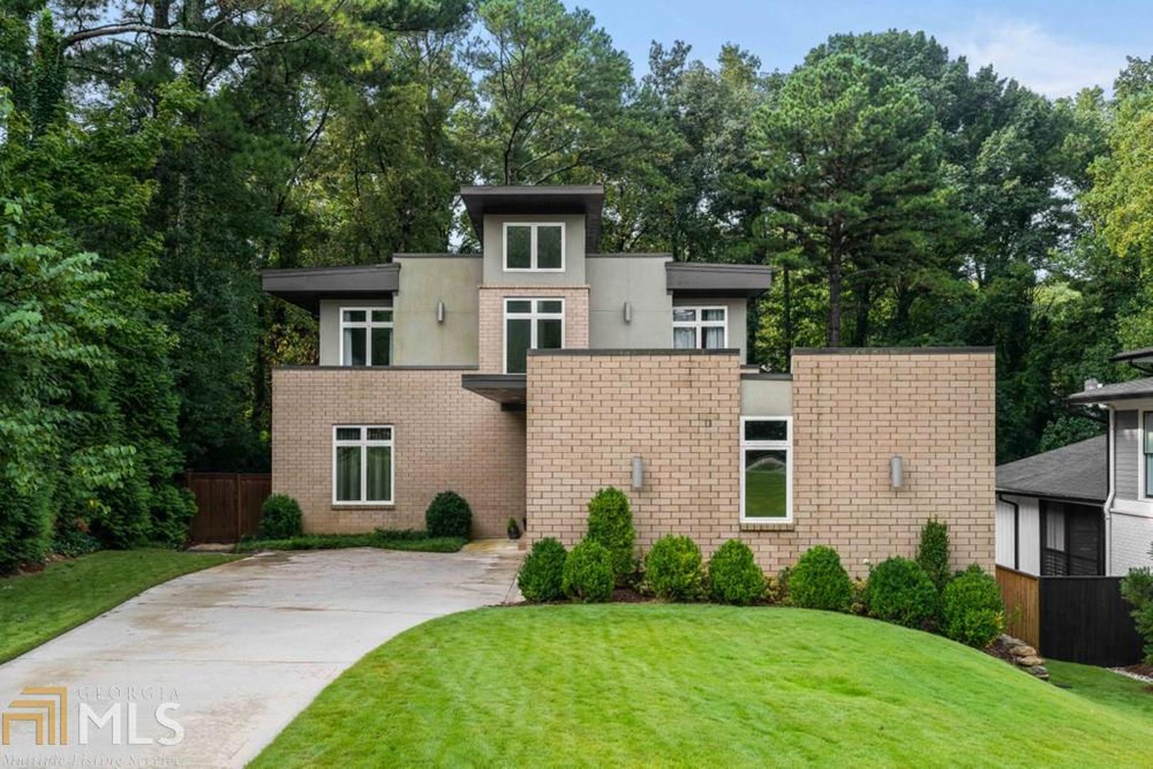 This modern home is an entertainer's dream - inside and out! Three levels of living space and multiple outside spaces open to a gorgeous pool and deck. A modern and open chef's kitchen with professional appliances and an island opens to the living room. This home blends the modern accents of glass and steel with wood to create warmth and inviting living spaces. The owners recently completed an incredible terrace level with a wine cellar, bar area, media room/bedroom, and exercise room. Please contact agent with any questions. Owner is willing to sell home furnished (minus some artwork) so this could be turnkey for your buyer.