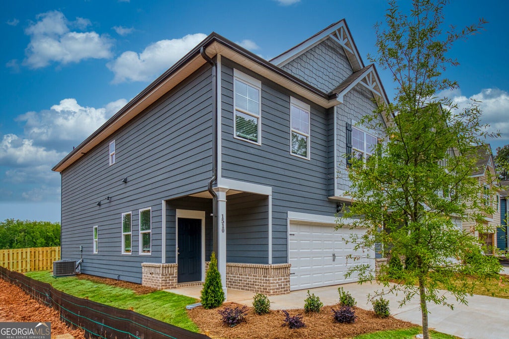 Photo of 662 Ellis Spring Way #LOT 63, Lawrenceville, GA 30045 (MLS # 10869363)