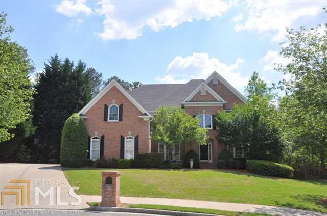 5 BDRM, 4 BATH & 2 Half BA Brick Traditional Home in desirable Glen Abbey Swim/Tennis Community. Open & flowing floor plan featuring a 2 story Foyer opening to a Formal Living & Dining RM. Main Floor Guest Suite w/Full BA. Spacious 2 story Family RoM w/hardwood floors, Fireplace, Built-In Bookcases & Art Niches. Updated Kit. w/Granite Counters, S/S Appl, under counter lighting, pantry & wet bar opening to the Family RM. Expansive Master Suite w/fireside Sitting RM, updated Spa Bath & His & Her Closets. Spacious secondary BRMS. Fin. Terrace LVL. Level, grassy backyard!