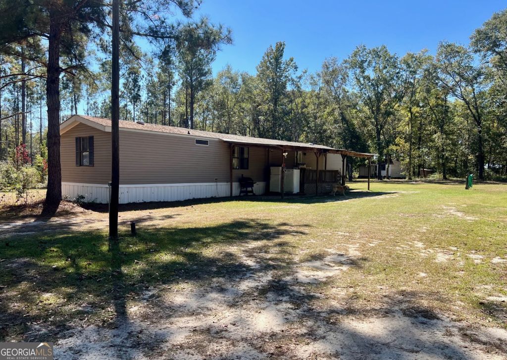 Photo of 6055 Sunhill Grange Road, Davisboro, GA 31018 (MLS # 10629274)