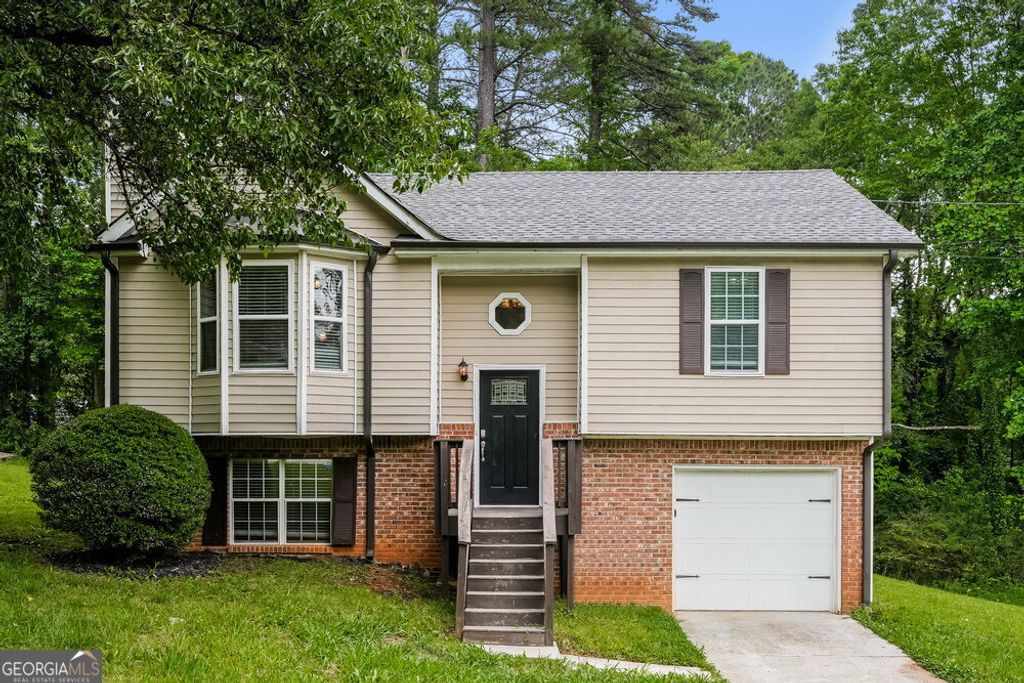 Photo of 6609 Swift Creek Road, Lithonia, GA 30058 (MLS # 10690560)