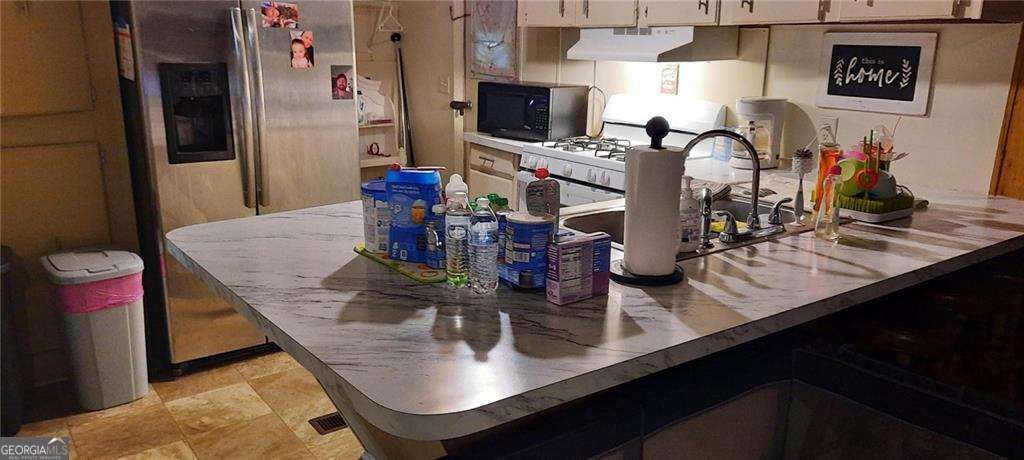 Photo of 201 Rogers Street, Mcdonough, GA 30253 (MLS # 10656960)