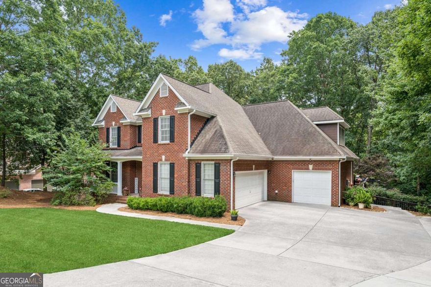 For $839,000 - space, comfort, and opportunity in Chattahoochee River Club!  Welcome to 4890 N River Dr, a timeless 3-sided brick home on nearly an acre in South Forsyth's premier swim/tennis community. With 6 bedrooms, 6 baths, and 5,700 sq. ft., there's room for everyone - including a finished basement with a second living area, kitchenette, and media room.    Enjoy hardwoods on the main, an updated owner's suite with custom closets, and an open-concept kitchen and family room perfect for entertaining. The fenced backyard with a firepit and covered patio is made for gatherings.    Move-in ready, with the opportunity to make it your own, and just minutes from top schools, shopping, and Lake Lanier.