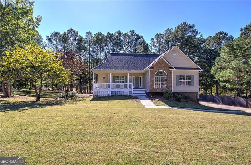 This one has it all-style, space, and location! This gorgeous 3 bedroom, 3 bath home has been completely updated and is ready for its next chapter. The main level features 3 bedrooms and 2 baths, while the finished downstairs offers a spacious bonus room with its own full bath-perfect for guests, a home office, or extra living space. Fresh paint, modern fixtures, stainless steel appliances, new faucets, and updated door hardware bring a crisp, like-new feel throughout. The oversized garage is a dream with plenty of room for parking plus an additional workshop area, and outside you'll love the matching outbuilding for even more storage. All of this sits on a full acre of open, inviting land, giving you the perfect mix of neighborhood living and a little extra elbow room. Located in the sought-after Highland Pointe Subdivision in White, GA, you'll be just 15 minutes from both Cartersville and Canton, where you'll find shopping, restaurants, medical facilities, and weekend entertainment. Both areas are thriving and growing fast, making this location as smart as it is convenient.