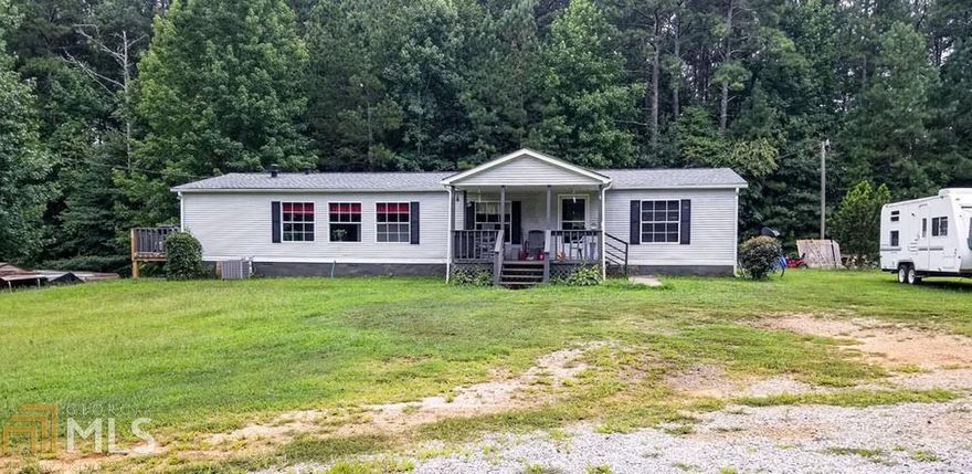Enjoy your privacy in this roommate style 3 bdrm, 3 bath cozy home with hardwoods throughout. In the kitchen, there is ample cabinet and counter space. The master bedroom has master bath with separate shower and large tub. SItting on .7 acres enjoy some privacy in your new home. Roof and gutters just under a year old. *Back on the market, due to no fault to seller*