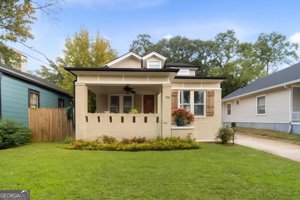 Step into timeless charm with a modern twist! This beautifully updated 1930s Capitol View home offers 4 spacious bedrooms, 2.5-3 baths, and over 2,300 sq. ft. of thoughtfully designed living space - all enhanced by more than $80,000 in upgrades. The heart of the home is a fully reimagined kitchen, complete with sleek new cabinets, quartz countertops, a touchless faucet, and premium Samsung Elite appliances. Every bath feels like a private spa with custom vanities, updated fixtures, a freestanding soaking tub, and luxurious shower spa systems. You'll love the gleaming hardwood floors throughout, brand-new windows that fill the home with natural light, and the peace of mind that comes with a new roof plus fully updated plumbing, electrical, and HVAC systems. Recessed lighting and ceiling fans bring a warm, inviting glow, while the landscaped yard, SimpliSafe alarm, and Ring doorbell add convenience and security. Located just minutes from the BeltLine, MARTA, and Downtown Atlanta, this home delivers the perfect blend of historic charm, move-in-ready comfort, and modern convenience.