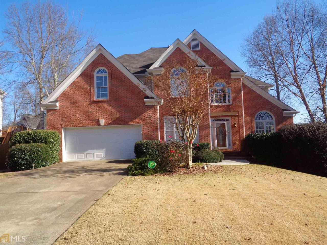 This Executive Home features MASTER SUITE with SITTING AREA, walk in closet, MASTER BATH with separate jetted tub and shower. Laundry room and 2 additional bedrooms with jack-n-jill bath complete the upstairs. Main Level features guest bedroom, FULL bath, two story family room, Formal living room and dining room. FINISHED BASEMENT with 2 bedrooms, bathroom, media room and kitchenette. FENCED BACKYARD.
