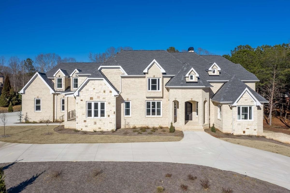 Legends at Chateau Elan. Large Executive size lot with Master on the main level and a second Mini master size bedroom on main LEVEL. Beautiful circular staircase in the foyer that ascends to both the upstairs and terrace level. A secondary set of steps off the kitchen, Open concept floor plan in the kitchen, keeping room and breakfast area. This home is on a full basement ready to be finished. The architecture of this home is simply timeless. Three bedrooms and an additional bedroom or use as a game or media room. Lots of hardwood floors, soaring ceilings, balconies off of some bedroom, and so much more. High end Appliances. Located conveniently close to the winery, spa, inn, conference center, as well as the equestrian center.