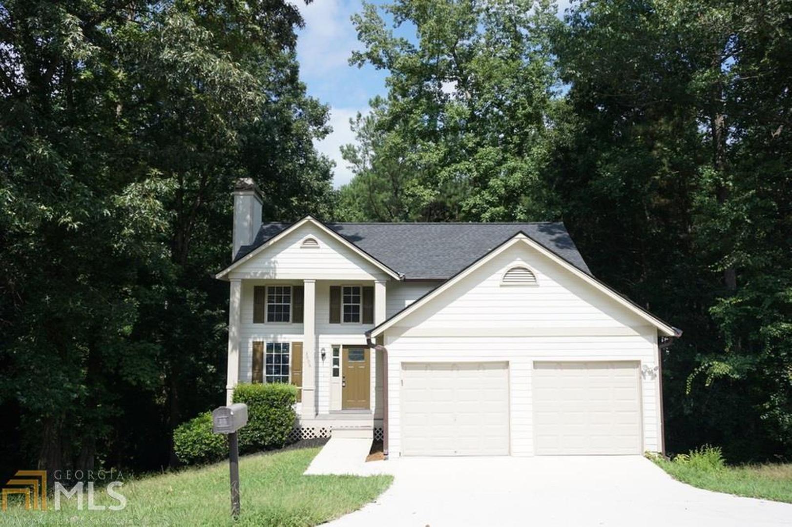 Fully renovated home in highly-desirable Decatur area is now BACK ON THE MARKET due to an out-of-state buyer deciding not to accept job in Georgia. This charming home has recently undergone a Top-to-Bottom renovation, including new interior and exterior paint, new flooring throughout, new garage doors, new roof, and all new insulation in the attic and crawl space. A dramatic 20-foot cathedral ceiling welcomes you into this home, which features an open concept floor plan including a fireside living room, bright dining area, and a fully updated kitchen boasting new kitchen cabinetry, subway tile backsplash, SS appliances, and a pantry. The oversized Owner's suite features a walk-in closet. Three additional secondary bedrooms upstairs with ample closet space. Home boasts a park-like backyard. Conveniently located to commuter routes (I-285 and I-20), shopping, and dining. Property sold AS-IS.