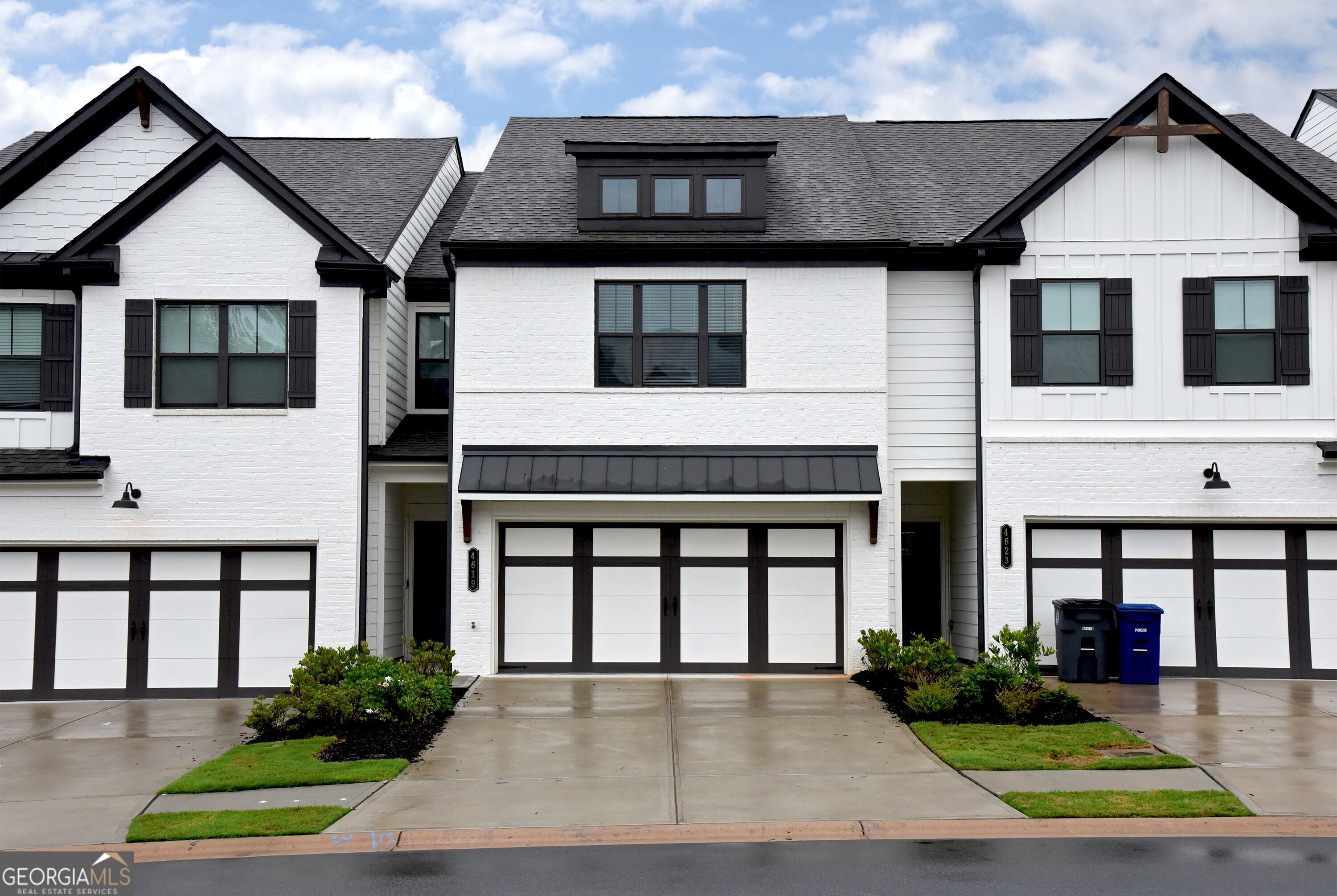 Welcome to Cypress Park! This stunning 2022-built modern townhome offers the perfect blend of style, space, and convenience ideally located near I-985 and just minutes from top-rated schools, shopping, dining, and more. Featuring 3 spacious bedrooms and 2.5 baths, this home is designed for comfort and functionality. The open-concept main level boasts beautiful hardwood flooring, a sleek electric fireplace with custom mantle, and a chef-inspired kitchen complete with granite countertops, stainless steel appliances, a large island with pendant lighting, and ample cabinet space. Upstairs, you'll find a generous primary suite with a tray ceiling, oversized walk-in shower, dual vanities, and a large walk-in closet. The two secondary bedrooms share a bright and stylish full bathroom and offer deep closets for extra storage. The laundry room, conveniently located on the same level as all bedrooms, includes a nearly new GE washer and dryer. Enjoy a 2-car garage, private back patio, and low-maintenance living in this beautifully maintained community.