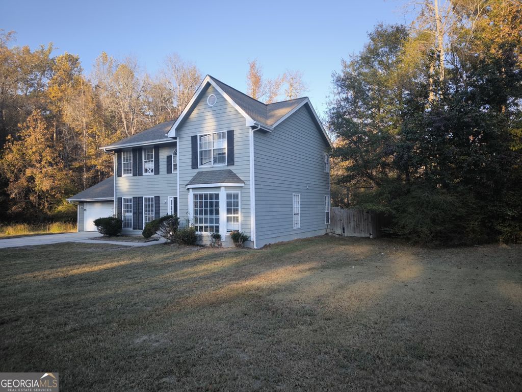 Photo of 6570 Smoke Ridge Drive, South Fulton, GA 30349 (MLS # 10639427)