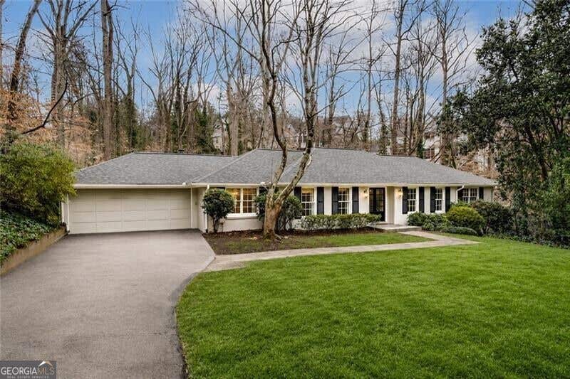Photo of 4601 Club Circle NE, Atlanta, GA 30319 (MLS # 10831965)
