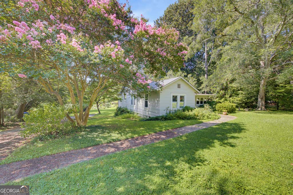 Photo of 3777 East Avenue, Clarkston, GA 30021 (MLS # 10828463)