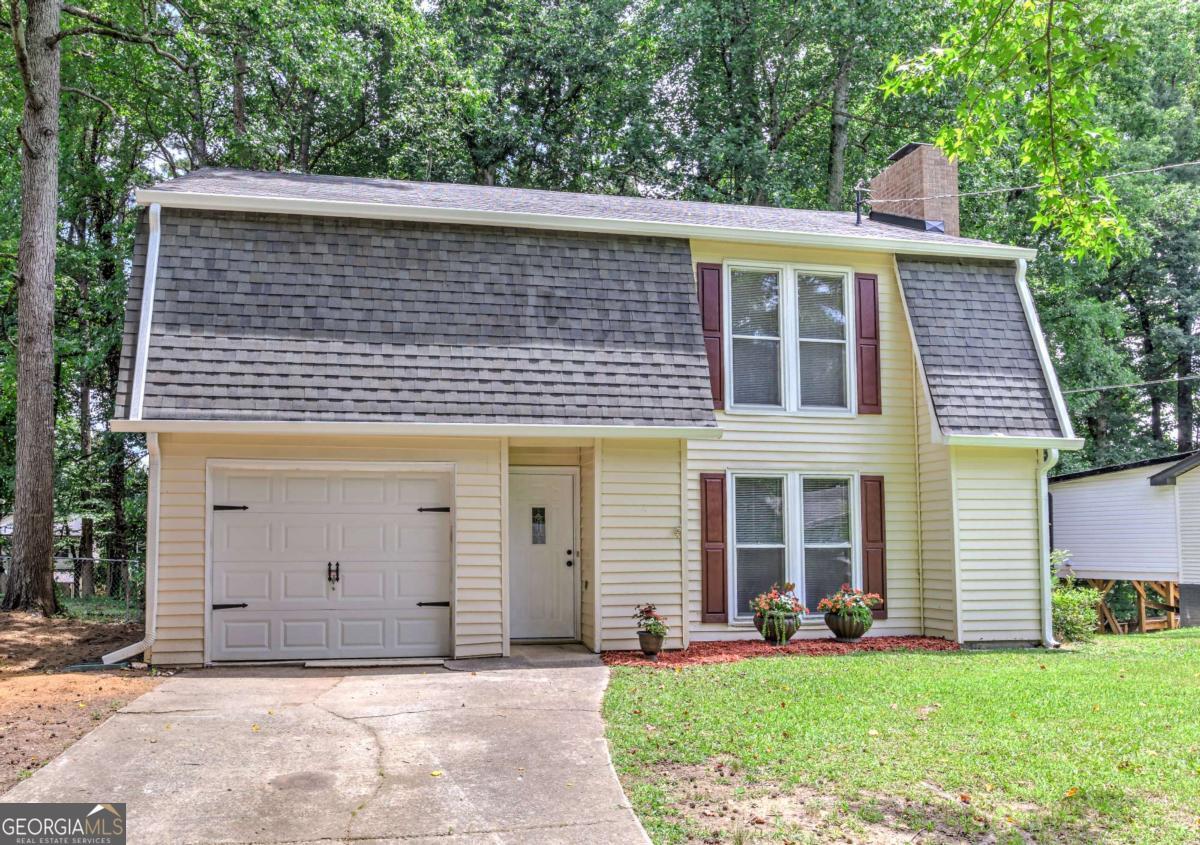 Come take advantage of the lowest rates of the year available and the lowest priced renovated Listing within a mile radius! Why the lowest priced, you ask? While this property has so much to offer, curb appeal just isn't one of them! Situated on nearly a half acre in a prime location with well ranked schools on a quiet dead end road. Come on in the front door and you'll be greeted by new waterproof LVP throughout the entire home with a new stained Oak tread stairwell boasting modern square newel post and square iron balusters. Kitchen featuring all new soft close cabinets, SS appliances, hardware, and fixtures. Out back you'll find a new sizeable deck for cooking and entertaining that looks over your spacious fenced in back yard. Upstairs you'll find that all 3 Bedrooms are oversized with walk in closets. Hard to find space like this in an older home in the area. Primary Bathroom renovated with a soft close double vanity with quartz top and tiled shower. Schedule your private tour and see it for yourself!