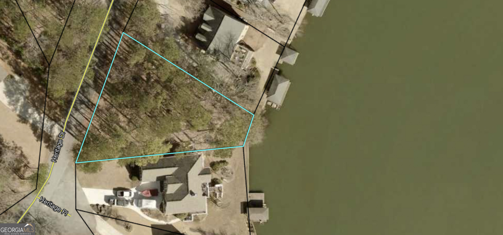 Lake Front building lot on Fairfield Plantation's 300 acre ski lake! Inside of this resort style community's secure gates offers the marina, beach, golf course, tennis courts, walking trails, two pools, and more!