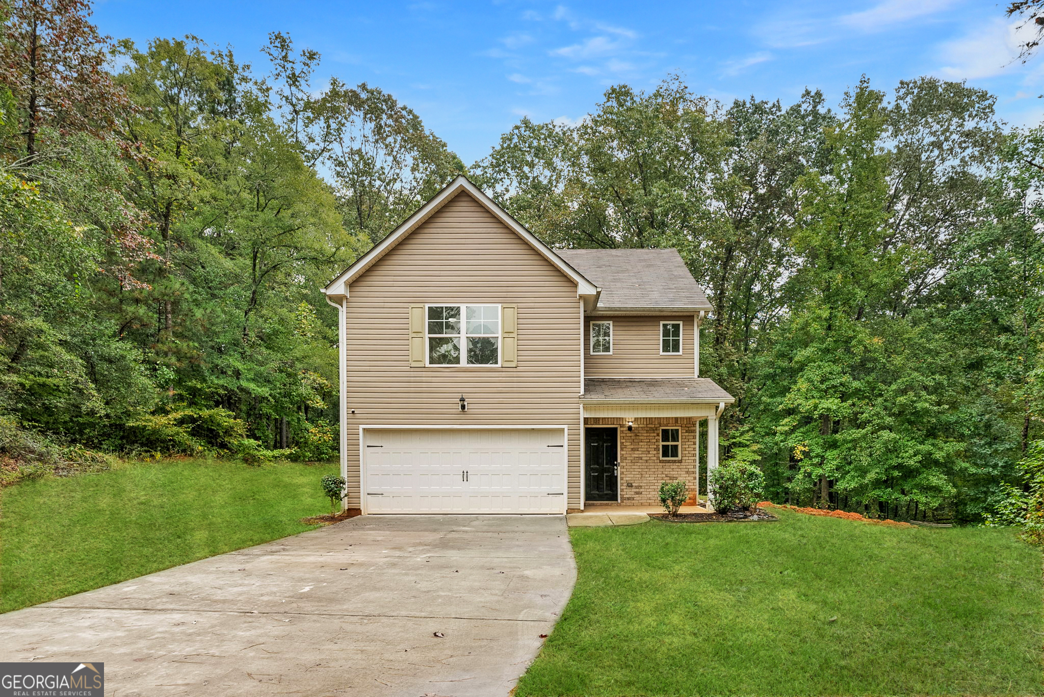 Tucked at the end of a quiet cul-de-sac, 175 Pine Ridge Rd is the kind of home that greets you like an old friend, with a warm welcome and zero pretension. Freshly updated and move-in ready, this 3-bedroom, 2.5-bath charmer has all the right touches: brand-new flooring underfoot, a clean coat of paint throughout, and an open layout that actually makes sense. Whether you're hosting Sunday brunch or racing to get out the door on a school morning, the flow here works with your life, not against it. The kitchen and baths have seen a thoughtful refresh, with newly redone cabinets, modern hardware, updated light fixtures, and sleek new mirrors that add just the right amount of polish. It has the crisp, clean feel of new construction but without the price tag or the wait. Every inch feels fresh, yet still grounded in the kind of comfort that makes a house feel like home. Out back, the private yard is a quiet retreat with room to play, space to entertain, and plenty of potential to make it your own. Whether it's a garden, a grill, or a lazy afternoon in a hammock, you've got the canvas to create something special. And when it comes to location, this one checks all the boxes. You're minutes from I-20, close to schools and shopping, and nestled in a peaceful corner of Covington that offers convenience without the chaos. For buyers looking for that move-in ready feeling without breaking the bank, 175 Pine Ridge Rd is a rare find that balances style, value, and everyday livability.