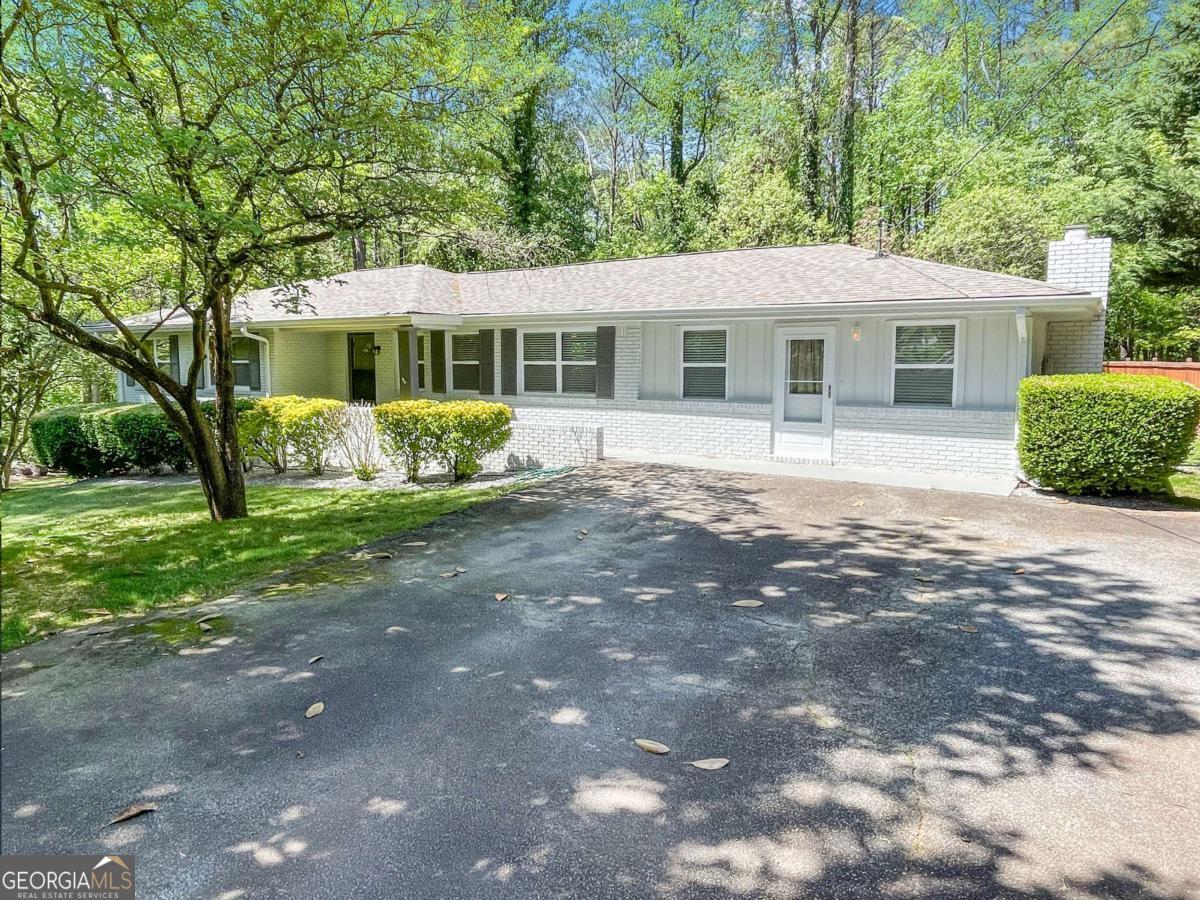 Available July 1! Completely renovated / modern brick ranch. No carpet! Open floorplan with two lg living areas. Living Rm is open to Dining Area and spacious Kitchen w/large island / breakfast bar. Kitchen has granite counters, abundant cabinets and SS appliances. Lots of recessed lighting too. Adjacent to the Kitchen is a separate Family Rm w/fplc, rear yard access and the laundry rm. At the other end is an updated Hall Bathroom, 2 Guest BRs, Master BR and an updated Master Bath w/dbl vanities and tiled shower with a bench. The rear yard is level and fenced and there is a separate driveway to a large parking pad for an RV or other vehicles. Resident Benefit Package included. Check out our 5-Star Reviews on Google. Rent quoted reflects discount for on time payment, ask for details.