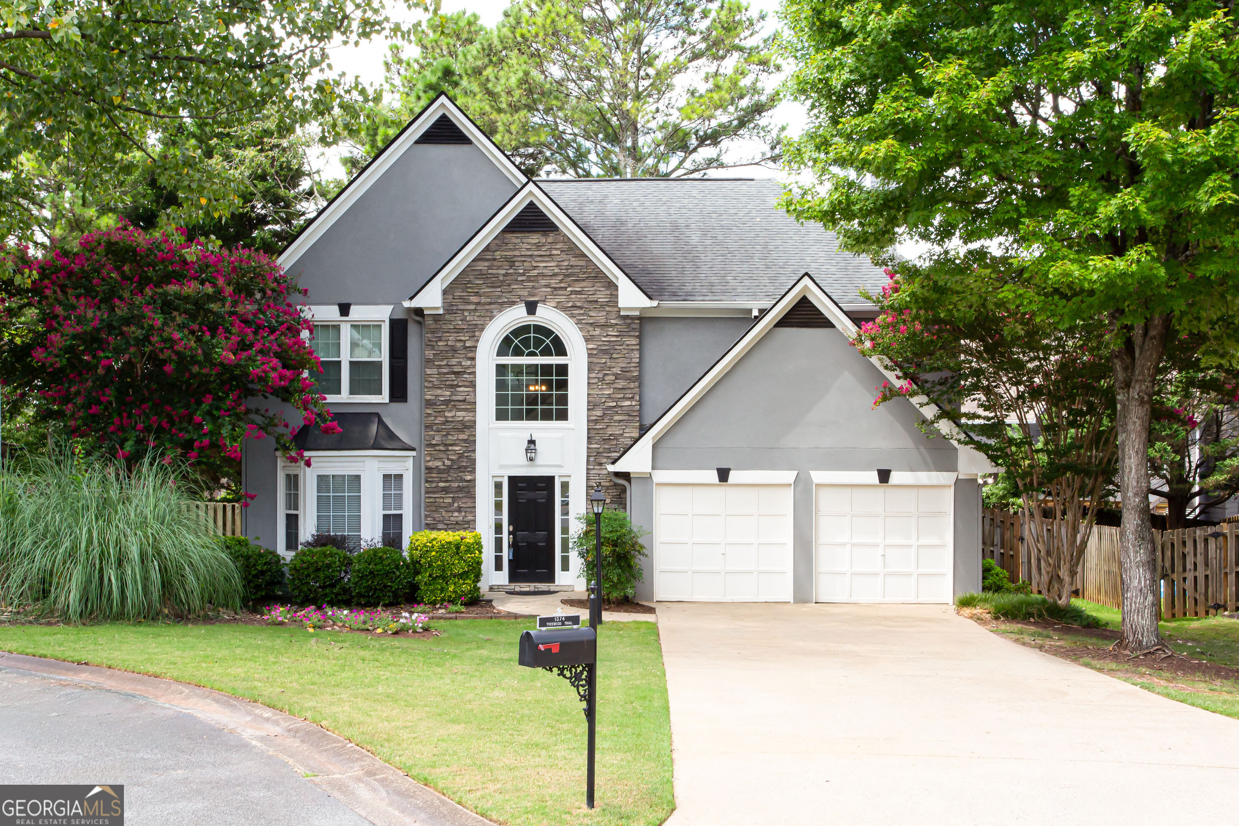 Welcome to this immaculate, move-in-ready home where style meets comfort. The impressive 2-story foyer leads to a stunning 2-story great room with cozy fireplace and perfect for gatherings. The main level also features a versatile formal living room and dining room that can be used as flex rooms. The cheerful kitchen features stainless appliances, white cabinets and a charming breakfast area. Beautiful wood flooring is featured on main level. An inviting sunroom offers a serene space to relax or as a flex room. The upper level includes 3 bedrooms and 2 full baths, reading nook, convenient laundry room with a huge walk-in storage closet. The entire home is filled with abundance of natural light creating an airly atmosphere. Recent updates include plush new carpert upstairs, new interior paint and new HVAC system for year-round comfort. Step outside to a private, fenced backyard for outdoor living. The property also includes spacious 2-car garage and storage.Community amenities are located on East Worthington Pkwy. Publix is within walking distance and the home is just 2.5 miles to I-75 making your commute more appealing. This is more than a house-it is a place to call home!