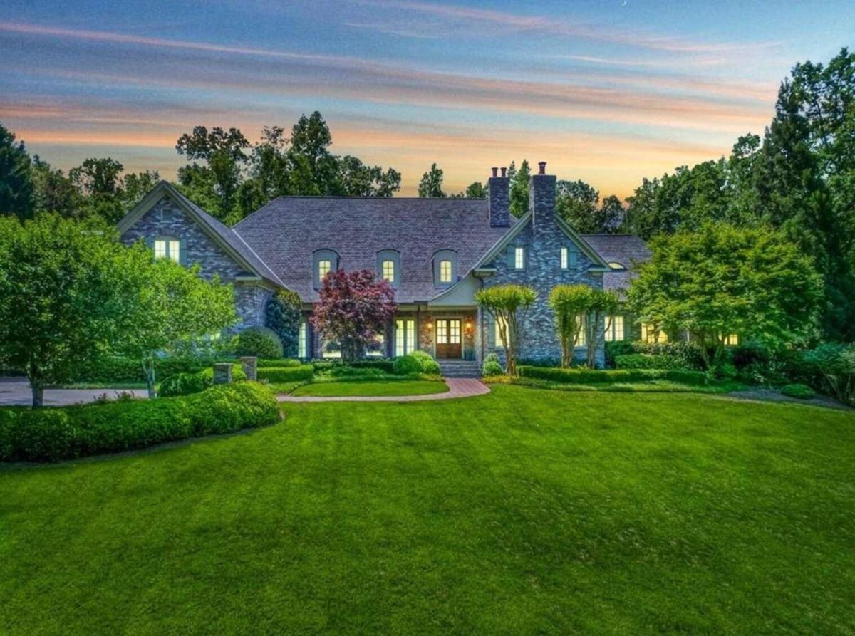 Amazing property with Sandy Springs taxes! Welcome to an exquisite Country French estate nestled on 1.9 gently rolling acres off a quiet street. This stunning residence features spacious living areas, ideal for both intimate gatherings and grand-scale entertaining, with high ceilings on all three levels. The open gourmet kitchen, adorned with top-of-the-line appliances and custom cabinetry, is a chef's dream come true. While the open family room offers a relaxing ambiance for everyday living, the elegant dining and living rooms are perfect for hosting formal dinners. The expansive primary suite is also on the main level tucked down a private hallway beyond a large private paneled office. All of the secondary bedrooms are also very spacious with ensuite baths. The Terrace Level has daylight across the back overlooking the pool and been optimally finished with a fireside billiard room and lounge area, second kitchen, changing rooms, full bath, home gym, true home theater, wine tasting room and craft room. Plus, there is almost that much space still unfinished for storage and expansion. This floorplan also offers a separate au pair apartment on the opposite end from the primary suite, providing flexibility and privacy for guests or live-in staff. This self-contained living space features its own bedroom, bathroom, kitchen and staircase, ensuring utmost convenience and comfort. From the moment you arrive you'll be captivated by an inviting atmosphere and breathtaking design elements including the curved main staircase, rich hardwood floors and creative spaces to display your art. All this surrounded by private, meticulously landscaped gardens and serene outdoor spaces. This sanctuary offers an oasis of relaxation and a seamless blend of indoor-outdoor living. Itas the perfect balance between exclusivity and accessibility. Enjoy the convenience of being just moments away from premier shopping, fine dining, and cultural attractions, while also relishing in the peacefulness of this secluded haven.