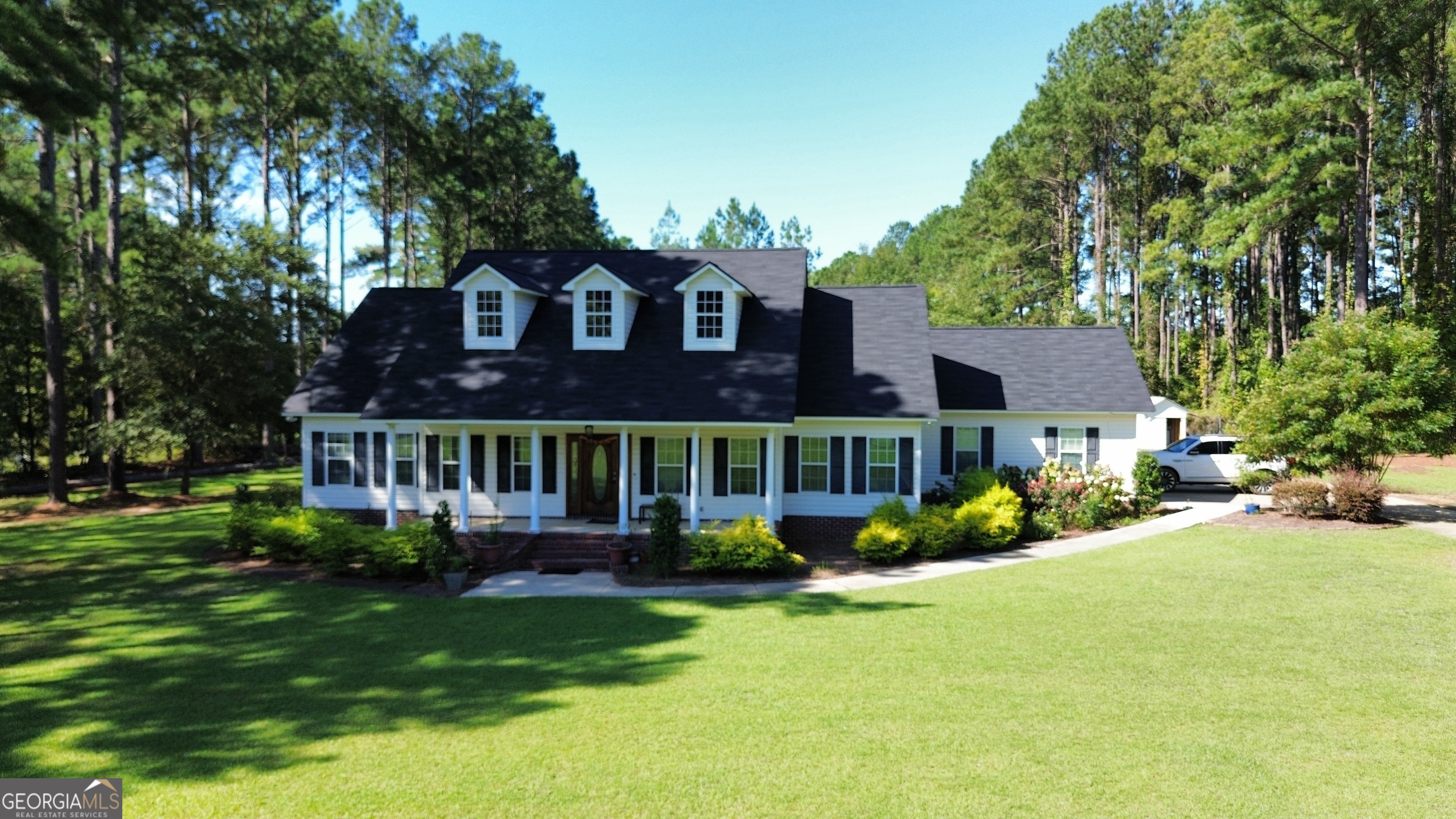 WELL APPOINTED HOME ON OVER AN ACRE WITH A SPARKLING POOL!! This Gorgeous 2184 sq ft Home has 3 Bedrooms, 2 Bathrooms, a tiled open concept kitchen overlooking the large living room with towering ceilings, electric log fireplace, and French doors leading out to the stunning pool. Location is key and this beauty is moments away from the interstate, schools, restaurants, hotels, college and shopping. Call to schedule a tour..(Home is being Sold As Is)