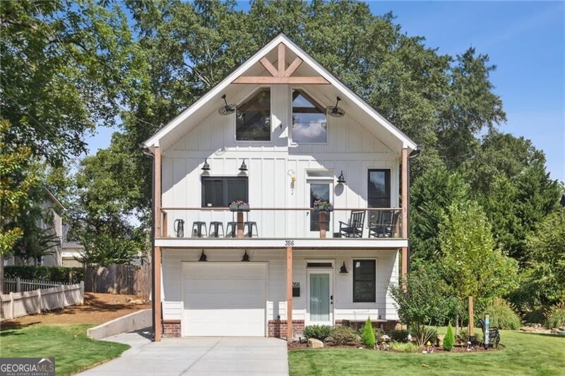 Exceptional opportunity to purchase one of the closest homes to the Marietta Square... and it's only 3 years old!!! BEAUTIFUL two story home custom designed by Dan Olah with 2 bedrooms and 2.5 baths that feeds into West Side Elementary and is just around the corner from Sessions Stand restaurant! Gourmet kitchen with custom stained cabinetry, quartz counter tops (soapstone on the island), stainless appliances and a beautiful black quartz farm sink. Large primary bedroom with custom closets, double vanity in the bath and a huge walk in shower. Second bedroom on the main level with a custom shower in the full bath. Also on the main level is a flex space that is currently configured as a secondary living room with French doors out to the back and a cool garage door opening to the front driveway perfect for yard parties, watching the fireworks or just entertaining friends! It can also be used as a tandem 2 car garage and is covered in an indoor/outdoor turf that could easily hold a car. On the front of the home is a cool balcony that overlooks the Mountain to River Multi-Use Trail and if you turn left, it leads directly to the Marietta Square. If you turn right, it leads straight to Kennesaw Mountain National Battlefield Park! Designer lights, fixtures and paint throughout! Appointment only.