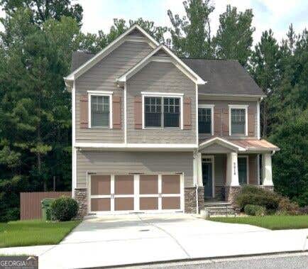 Photo of 2215 COLLINS RIDGE Drive, ATLANTA, GA 30318 (MLS # 10826870)