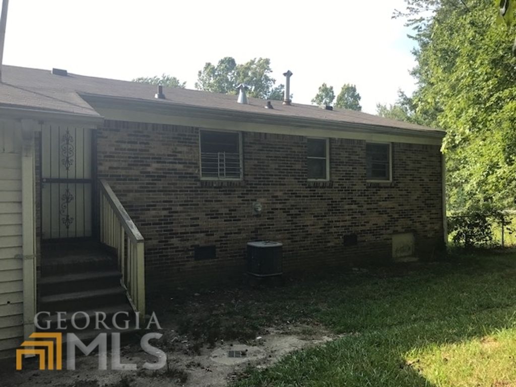 Photo of 300 Cedar Wood Court, Atlanta, GA 30349 (MLS # 10724962)