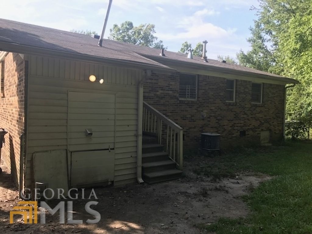 Photo of 300 Cedar Wood Court, Atlanta, GA 30349 (MLS # 10724962)