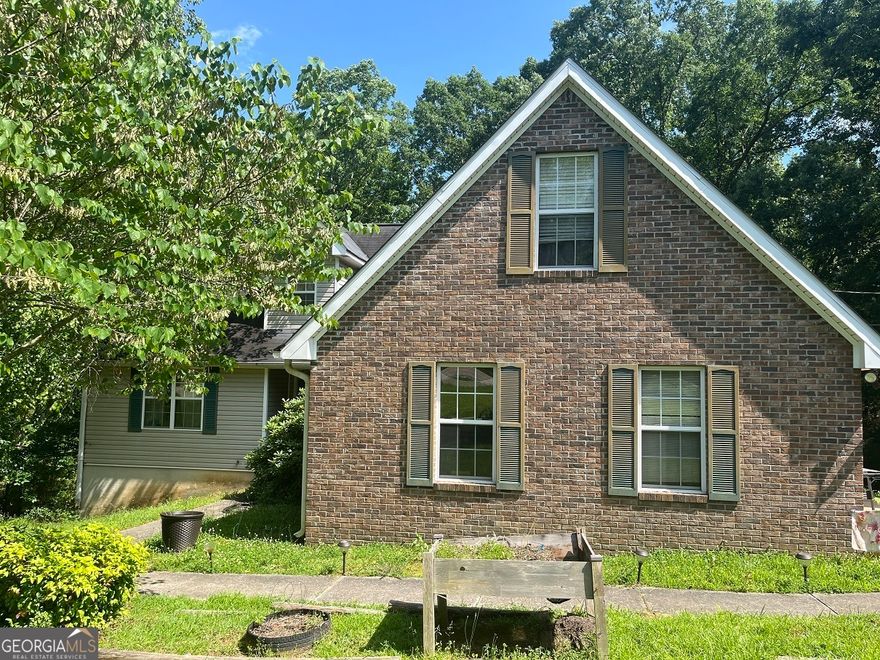 Welcome to your new home! This spacious 4-bedroom, 2.5-bathroom two-story home sits on a picturesque 1-acre lot in one of the area's most sought-after school districts. Offering the perfect blend of comfort, functionality, and potential, this home is ideal for families and entertainers alike. The walk-out basement is unfinished, providing a blank canvas for your dream recreation room, home gym, or additional living space-whatever your heart desires.  Enjoy serene mornings or lively evenings in your expansive backyard, offering endless possibilities for outdoor living, gardening, or play. With mature trees and plenty of privacy, this property is truly a rare find.Additional highlights include an attached garage, convenient main-floor laundry, and easy access to local amenities, parks and Athens  Don't miss your chance to own this incredible home in a location that checks all the boxes!