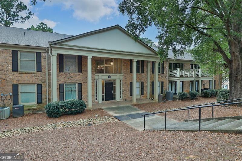 Looking for space, style, and location? This updated 3BR/2BA corner condo at The Park at Ashford has it all! Enjoy a ground-level entry with a private, tree-top balcony above. Inside, you'll find an open layout with new flooring, fresh paint, an updated primary bath, and French doors that fill the living space with light. The kitchen shines with stainless steel appliances, a breakfast bar, and a pantry. New HVAC + Ecobee smart thermostat included, along with washer/dryer and fridge - truly move-in ready! Gated community perks include a pool, private dock, dog park, and beautifully landscaped grounds. Plus, you're directly across from Blackburn Park (think trails, yoga, and food truck nights) and steps to YMCA, Cambridge Square, Kroger, and local dining spots. Just minutes to Perimeter Mall, Whole Foods, and MARTA. This is one of Brookhaven's best values, don't miss out! Message us today to schedule a tour.