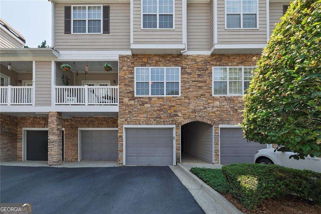Photo of 207 The Crossings Lane, Woodstock, GA 30189 (MLS # 10825604)
