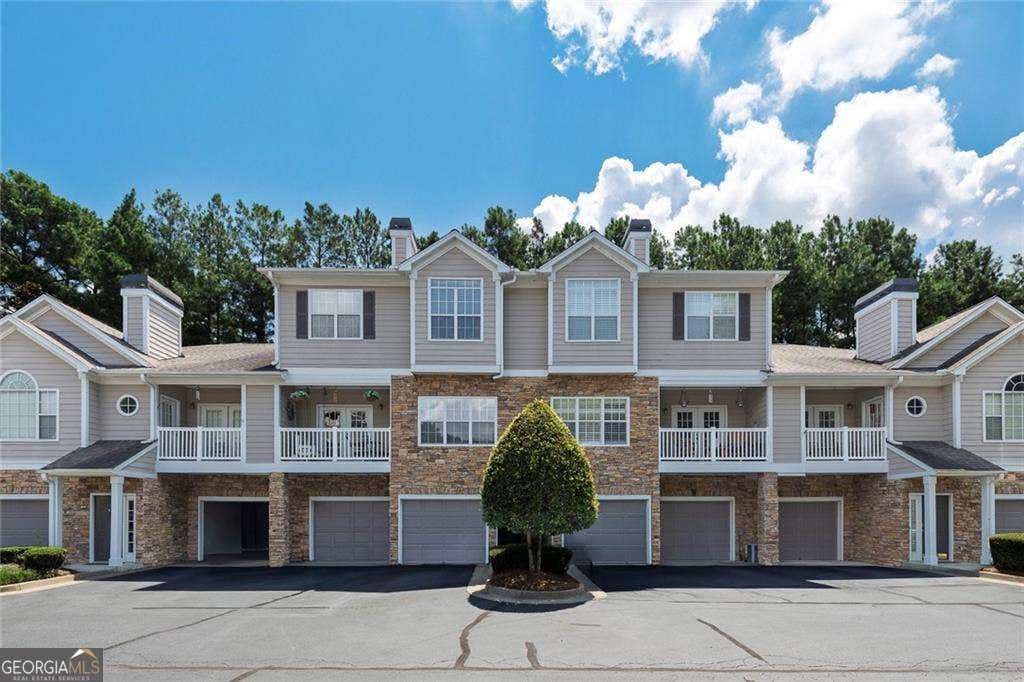 Photo of 207 The Crossings Lane, Woodstock, GA 30189 (MLS # 10825604)