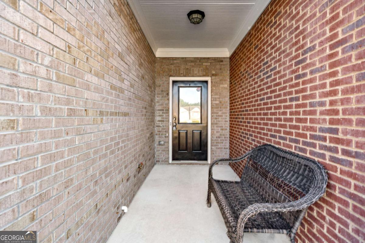 Don't miss this beautiful 3BR/2.5BA four-sided brick townhome in the sought-after Green Bridge Creek community of Lawrenceville! Featuring hardwood floors throughout, granite countertops, a cozy fireplace, and a private terrace, this home offers style and comfort in a prime location. Enjoy walking distance to parks, trails, shopping, and dining, plus top-rated schools. With a spacious master suite, two-car garage, and no rental restrictions, this gem won't last-apply today!