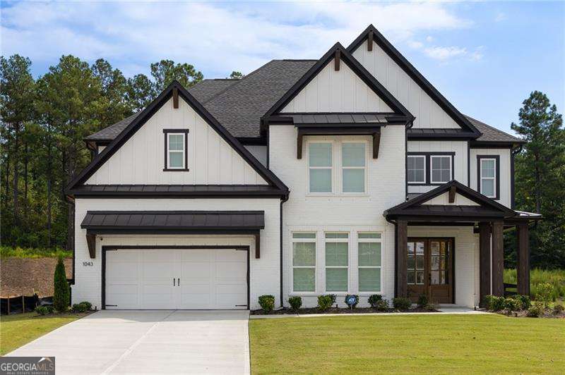 Welcome home to this executive home built by the Toll Brothers. It boasts five bedrooms, five bathrooms and a private backyard. The house features a whole house water filtration system, reverse osmosis water filtration system, high ceilings, upscale Smith & Nobel 3 Day blinds throughout, California closet systems throughout, an upgraded accordion door that opens to the beautiful, private backyard (no rear neighbors), and an enhanced outdoor living space ($38,160). There are too many luxurious appointments to list. The two-story grand foyer will greet your guest with open arms. The chef's kitchen features quartz countertops, a stunning island, quartz backsplash, Wolf appliances, and a hidden pantry. The kitchen opens to the family room with upgraded built ins. The dining room is ready to host your dinner parties. There is a flex space on the main floor that is perfect as an office or a play room. Your guest will enjoy their private elegant ensuite. You will enjoy the thoughtfully designed mudroom for everyday convenience and functionality. The high-end finishes continue to the second floor, which is appointed with engineered wood flooring. The primary suite boasts a tray ceiling, a sitting room, dual vanities, a luxurious shower with double shower heads, a soaking tub, and a walk-in closet that features a California closet system. The laundry room is conveniently located on the second floor. There are two ensuites with walk-in closets and one more ensuite. All the bedrooms boast a California closet system. Enjoy your evenings on your patio overlooking your private, fenced-in backyard. There are no rear neighbors. You will enjoy scenic lake walks, a resort-style pool with luxury fireplace, pool cabana, fire pit, and pickleball courts. All just minutes from downtown Alpharetta, Halcyon, Crabapple, Avalon, Canton Street, three premier golf courses, shopping, dining, and entertainment options. Don't miss this rare opportunity to own this exquisitely upgraded luxury home in one of the area's most desirable neighborhoods. Luxury, comfort, and convenience await. Schedule your private showing today. This is more than a home; it's your forever destination!