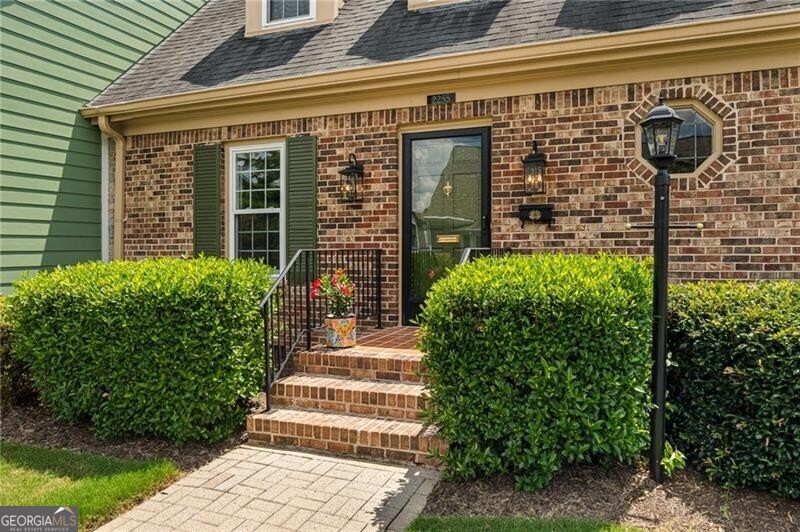 Imagine wanting a move-in ready townhome, with a 2-car garage, where all your living can be on ONE LEVEL! In this classic-style townhome community... This home is a few blocks from the Oak Grove district, with great restaurants, shopping, groceries...everything you need close by. The home features wide hallways, bright sun-filled rooms, plantation shutters, beautiful hardwood floors, NEW main-level bathroom w/ walk-in shower, Primary Bedroom on the main level. Screened-in porch, full-sun backyard, with a breezeway, leading to your private oversized 2-car garage, with an automatic door. This community offers driveways in the rear of each home, beautifully maintained exteriors and landscaping, along with a clubhouse and pool at the rear of the property. Upstairs offers 2 oversized suite-bedrooms, with one updated bathroom in the Primary Suite with a huge walk-in closet, and the other Bedroom features large bay windows, original, beautiful vintage tile, and a large closet. Updated lighting throughout, recessed lighting added in kitchen, back porch finished & screened-in, and thoughtful updates included. Newer HVAC units and hot water heater installed. This home has an abundance of closets on both levels. The layout is very well appointed. The home has been recently painted inside and is meticulously cared for. Townhomes like these don't come on the market often. Be a part of the Brianwood Condominium lifestyle. THANK YOU for showing.