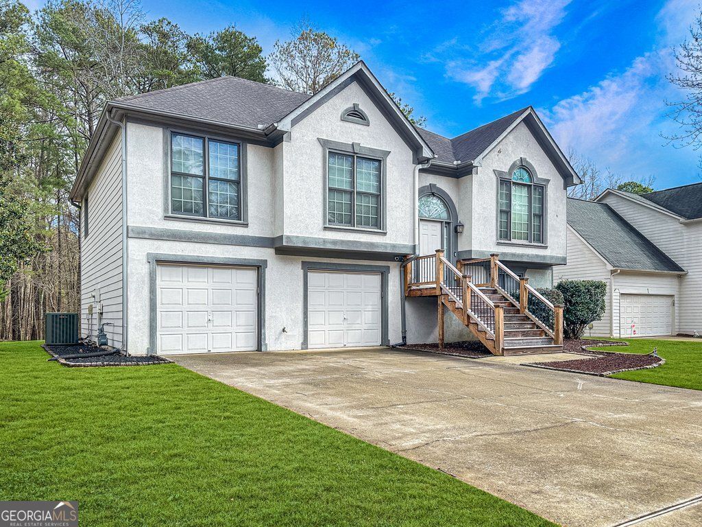 Photo of 7138 Big Woods Drive, Woodstock, GA 30189 (MLS # 10702104)