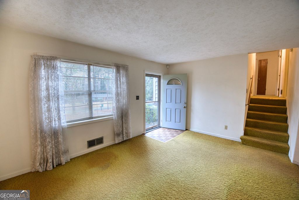 Photo of 6100 Mincey Road, Stone Mountain, GA 30087 (MLS # 10674692)