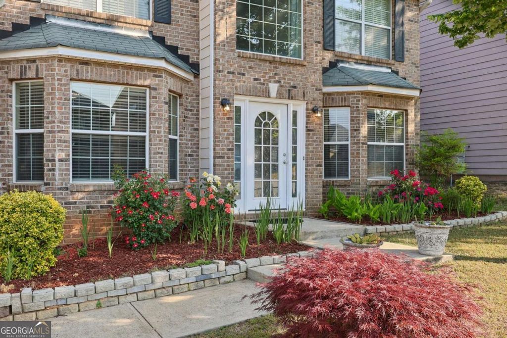 Photo of 1943 Tulip Petal Road, Auburn, GA 30011 (MLS # 10741365)