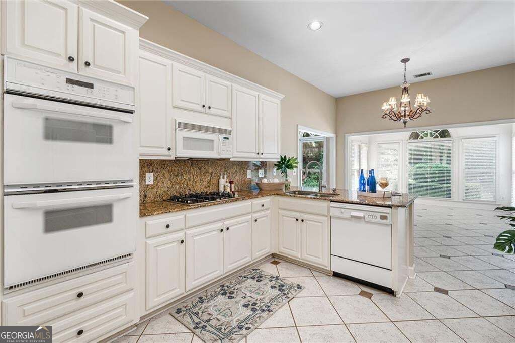 Photo of 2613 Peterboro Row, Marietta, GA 30062 (MLS # 10871441)