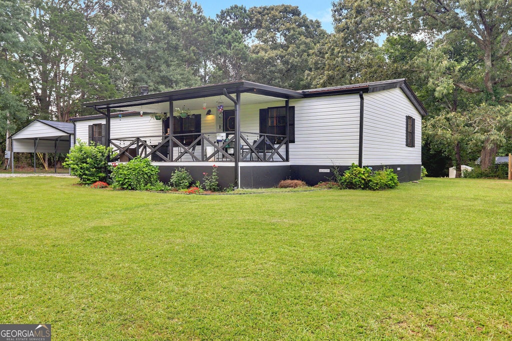 Photo of 223 Russell Road, Milner, GA 30257 (MLS # 10795711)