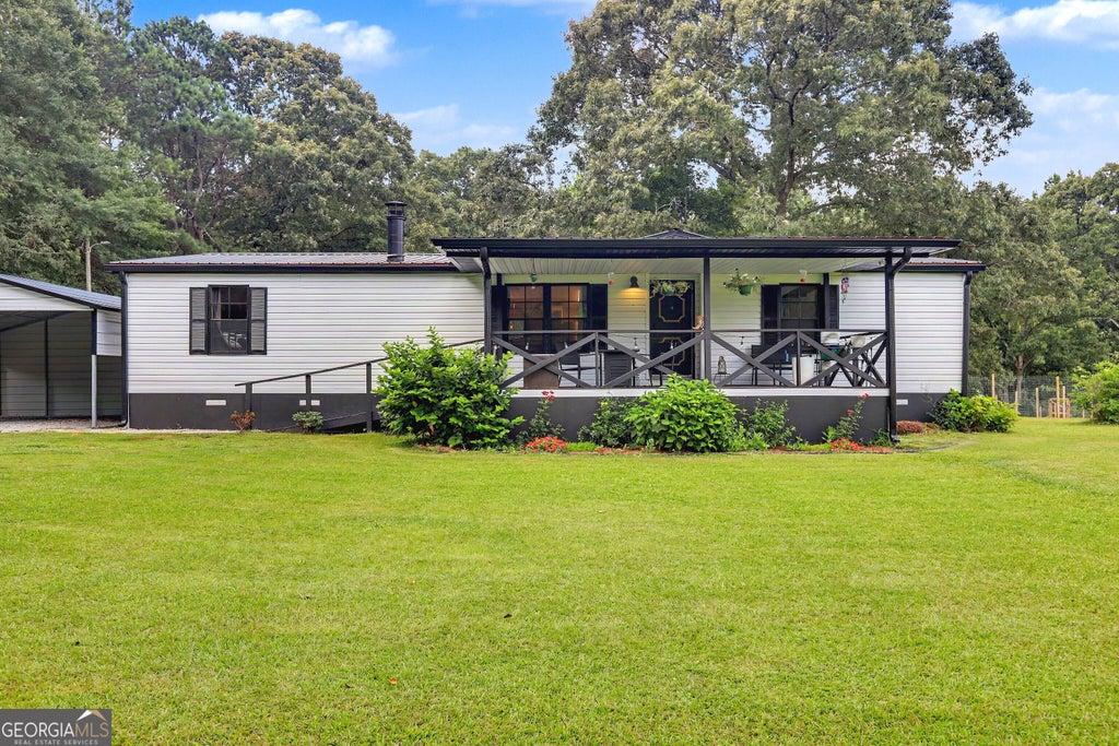 Photo of 223 Russell Road, Milner, GA 30257 (MLS # 10795711)