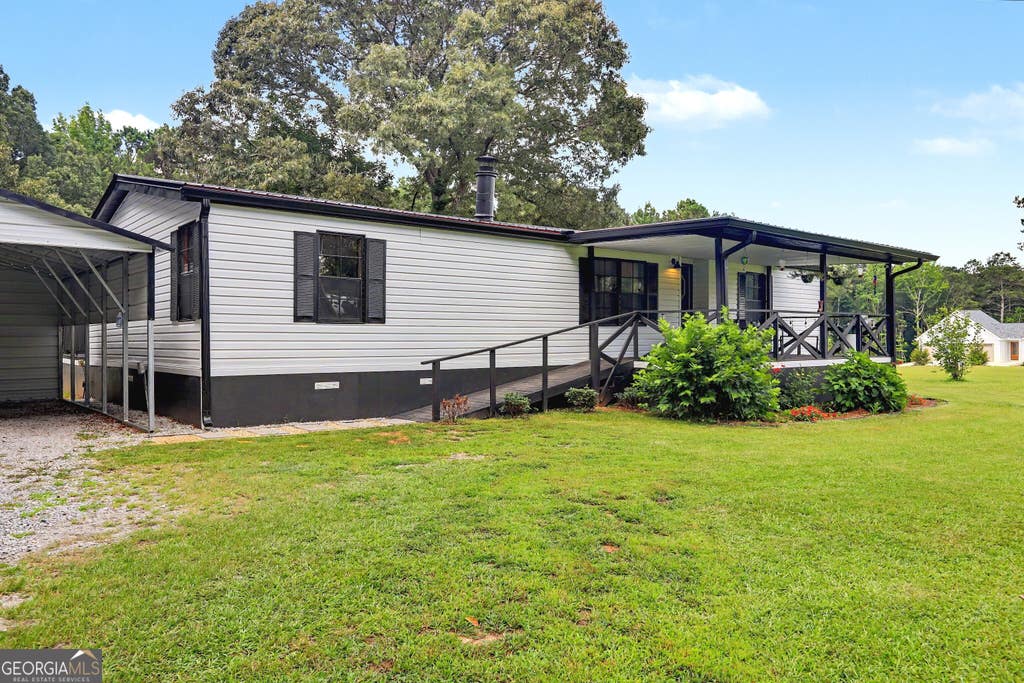 Photo of 223 Russell Road, Milner, GA 30257 (MLS # 10795711)