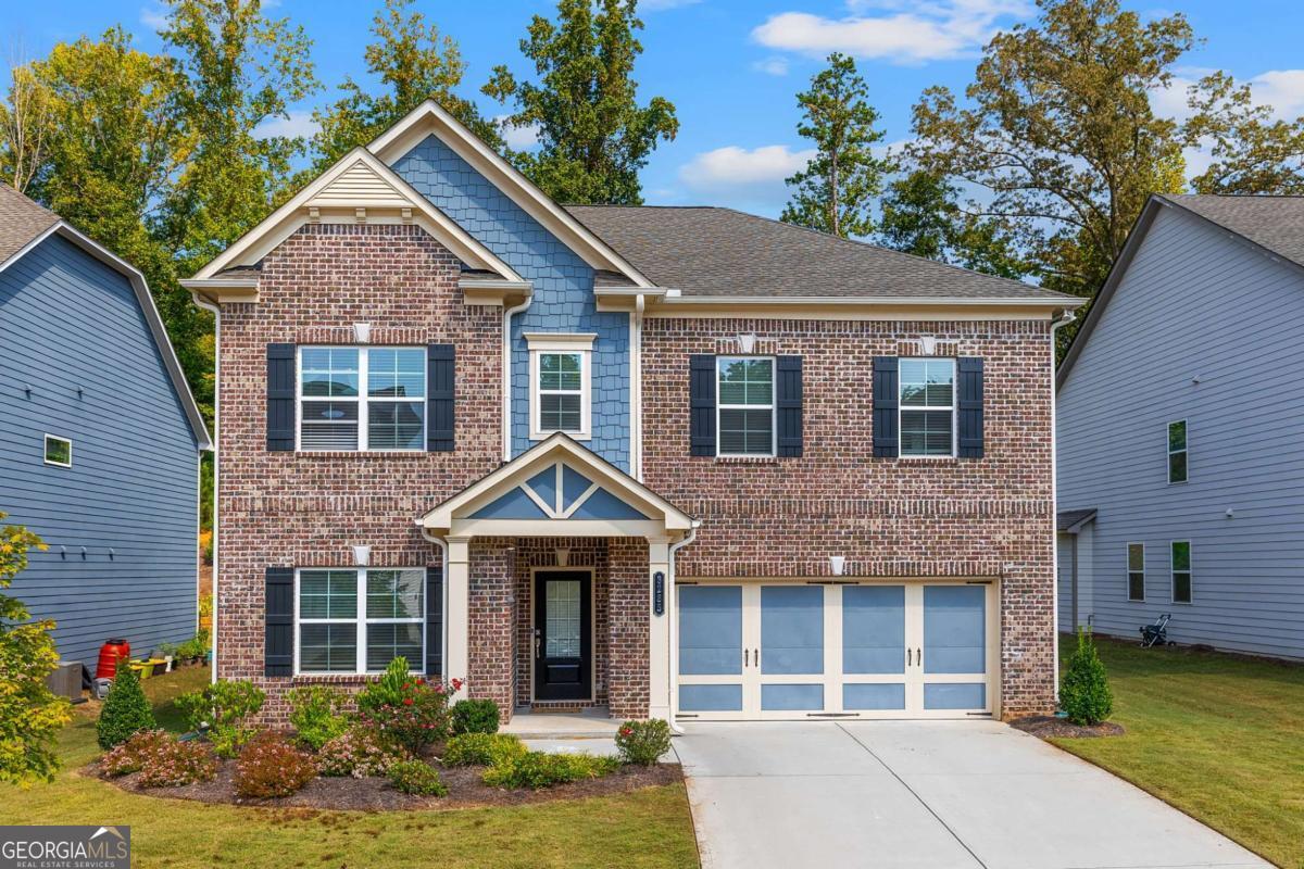 Welcome to this turnkey home, built in 2022 and cared for like new! Situated on a 1/4 acre lot, this property blends comfort, convenience, and community living. Inside, you'll find a spacious kitchen with a gas range top, built-in microwave, built-in oven, large pantry, and oversized refrigerator-perfect for any home chef. The master suite boasts a luxurious bath with a large walk-in shower and separate soaking tub, creating your own private retreat. With a 2-car garage and thoughtful design throughout, the home is move-in ready. Step outside and enjoy the vibrant neighborhood amenities, including a tennis court, basketball court, pool, and community hall. This is more than just a house-it's a lifestyle in one of Cumming's most desirable communities.